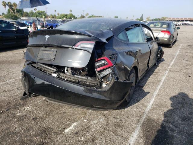 Photo 4 from auction – 2021 TESLA MODEL 3 with VIN 5YJ3E1EB1MF073366