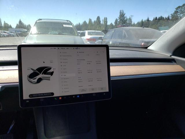 Photo 9 from auction – 2021 TESLA MODEL Y with VIN 5YJYGAEE0MF231433