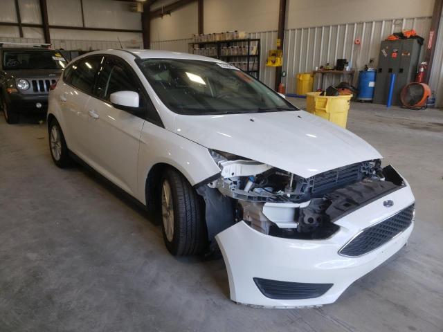 FORD FOCUS SE 2018 with VIN 1FADP3K27JL212560 - Photo from auction