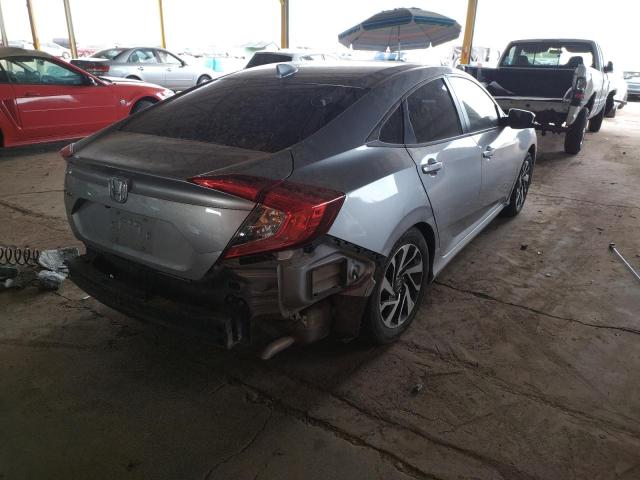 Photo 4 from auction – 2018 HONDA CIVIC EX with VIN 19XFC2F77JE013841