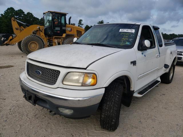 Photo 2 from auction – 2000 FORD F150 with VIN 1FTRX08L7YKA37225