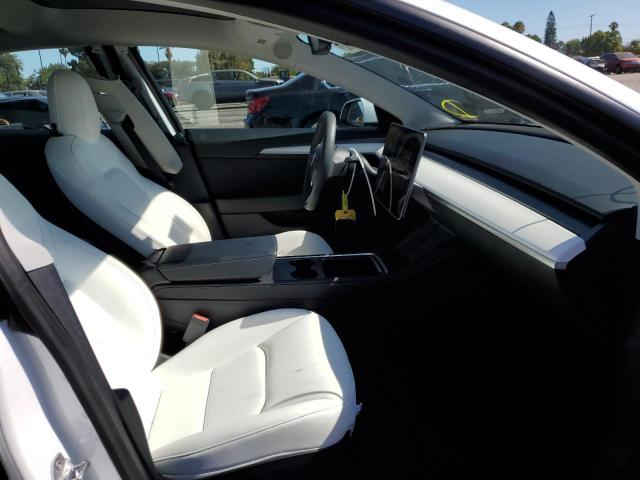 Photo 5 from auction – 2021 TESLA MODEL 3 with VIN 5YJ3E1EC1MF077085