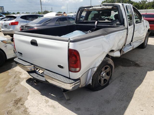 Photo 4 from auction – 2002 FORD F150 with VIN 1FTRX17W32NB28466