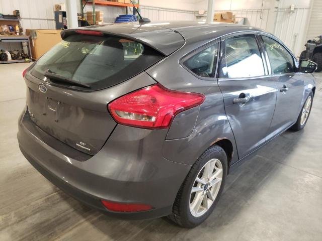 Photo 4 from auction – 2015 FORD FOCUS SE with VIN 1FADP3K29FL369093