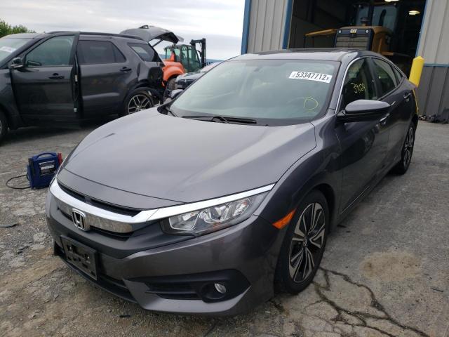 Photo 2 from auction – 2018 HONDA CIVIC EX with VIN JHMFC1F3XJX042398
