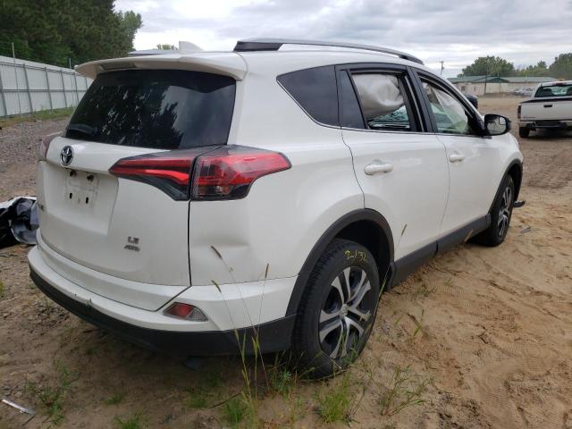 Photo 4 from auction – 2018 TOYOTA RAV4 LE with VIN JTMBFREV4JJ221256