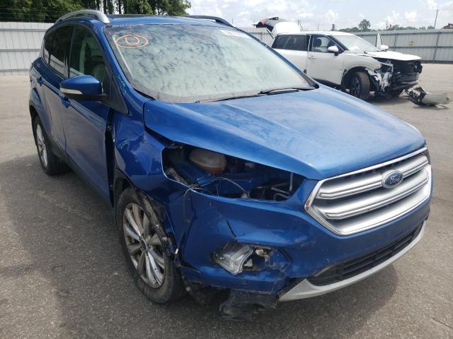 FORD ESCAPE TIT 2017 with VIN 1FMCU9J97HUA75412 - Photo from auction