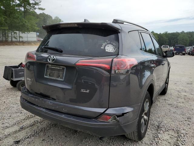 Photo 4 from auction – 2016 TOYOTA RAV4 XLE with VIN JTMWFREV9GJ061952