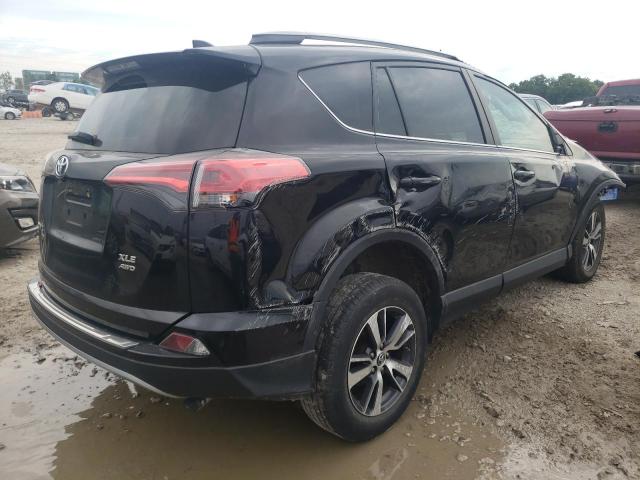 Photo 4 from auction – 2017 TOYOTA RAV4 XLE with VIN 2T3RFREVXHW644191