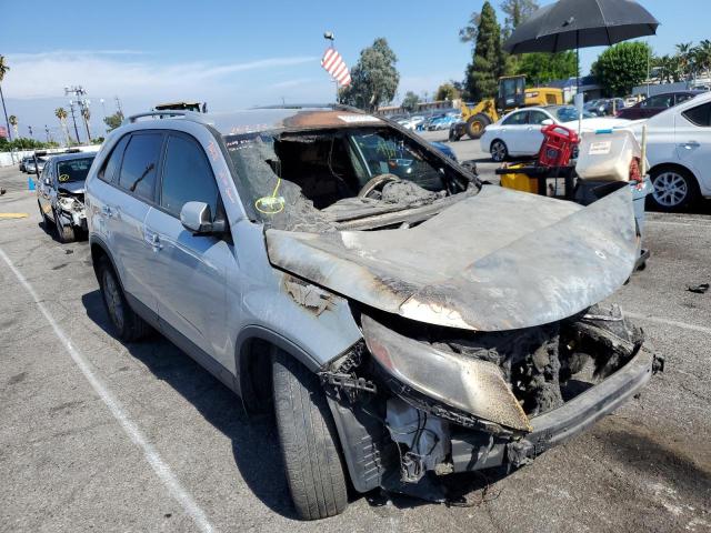 KIA SORENTO LX 2014 with VIN 5XYKT4A69EG521942 - Photo from auction