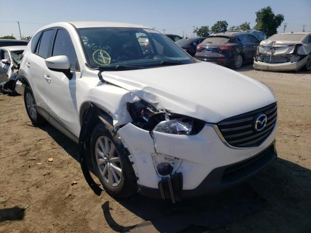 MAZDA CX-5 SPORT 2016 with VIN JM3KE2BY1G0900206 - Photo from auction