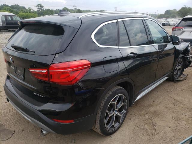 Photo 4 from auction – 2018 BMW X1 XDRIVE2 with VIN WBXHT3C33J5L29865