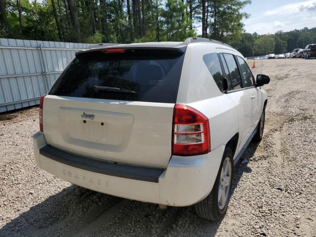 Photo 4 from auction – 2010 JEEP COMPASS SP with VIN 1J4NT4FB1AD611897