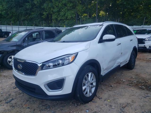 Photo 2 from auction – 2016 KIA SORENTO LX with VIN 5XYPG4A31GG076566