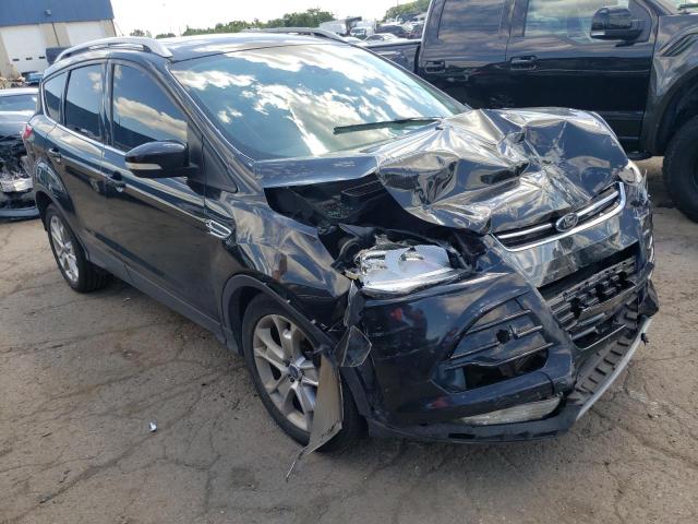 FORD ESCAPE TIT 2014 with VIN 1FMCU0J91EUC66735 - Photo from auction
