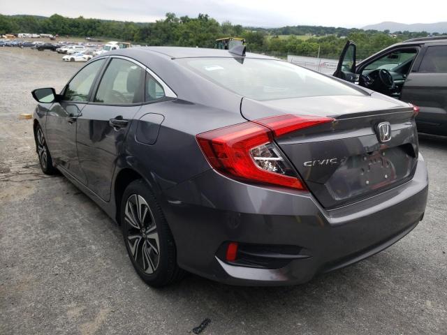 Photo 3 from auction – 2018 HONDA CIVIC EX with VIN JHMFC1F3XJX042398
