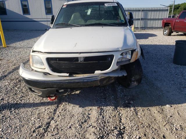 Photo 9 from auction – 2000 FORD F150 with VIN 1FTRX18LXYNA80705