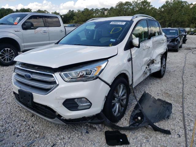 Photo 2 from auction – 2017 FORD ESCAPE TIT with VIN 1FMCU9J98HUF03651