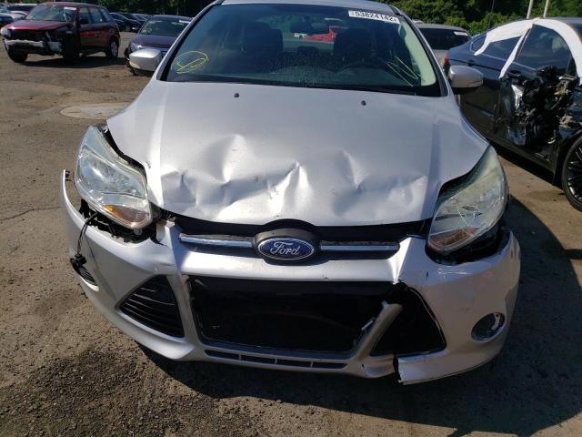 Foto 9 de la subasta – 2013 FORD FOCUS SE con VIN 1FADP3F25DL288132