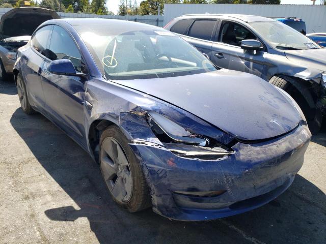 TESLA MODEL 3 2021 with VIN 5YJ3E1EBXMF999538 - Photo from auction