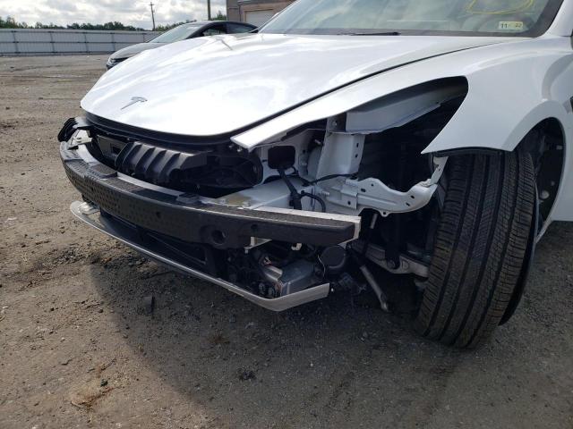 Photo 9 from auction – 2021 TESLA MODEL 3 with VIN 5YJ3E1EAXMF099410