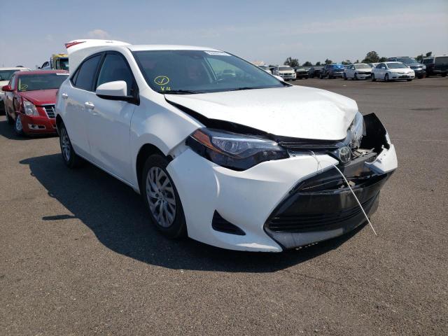 TOYOTA COROLLA L 2017 with VIN 5YFBURHEXHP615691 - Photo from auction