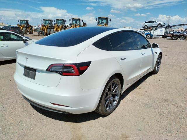 Photo 4 from auction – 2021 TESLA MODEL 3 with VIN 5YJ3E1EA2MF000868