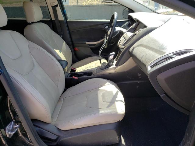 Photo 5 from auction – 2015 FORD FOCUS TITA with VIN 1FADP3J29FL275085
