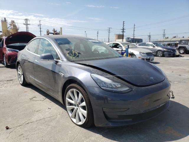 TESLA MODEL 3 2018 with VIN 5YJ3E1EB6JF185074 - Photo from auction