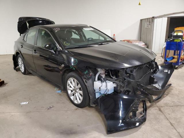 TOYOTA CAMRY LE 2020 with VIN 4T1C11AK2LU949977 - Photo from auction