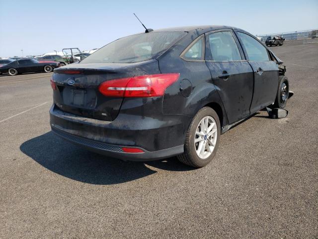Photo 4 from auction – 2016 FORD FOCUS SE with VIN 1FADP3F20GL337709
