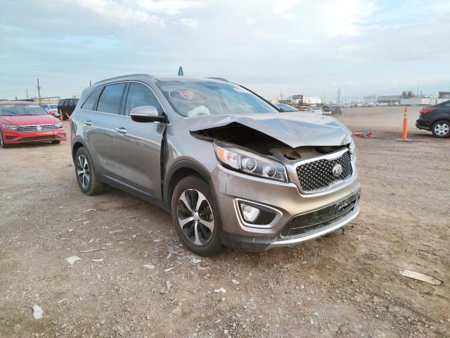 KIA SORENTO EX 2016 with VIN 5XYPH4A52GG140144 - Photo from auction