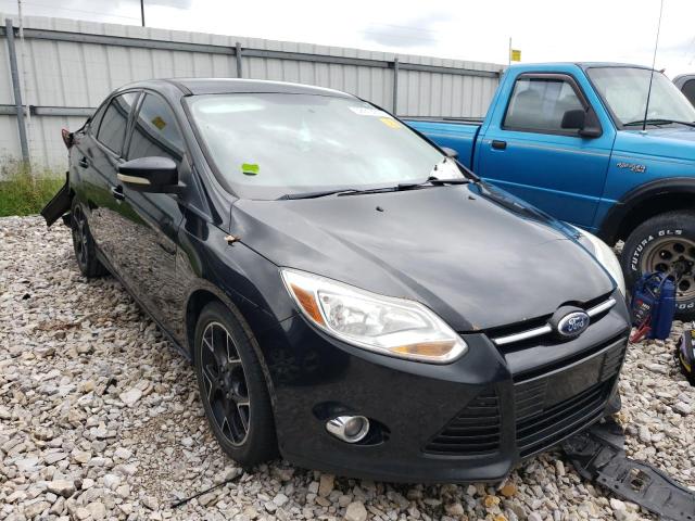 FORD FOCUS 2012 with VIN 1FAHP3F25CL322960 - Photo from auction