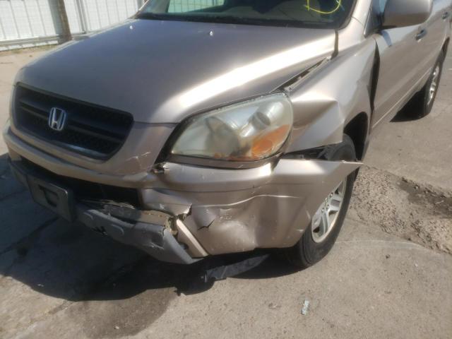 Photo 9 from auction – 2004 HONDA PILOT EX with VIN 2HKYF18624H569330