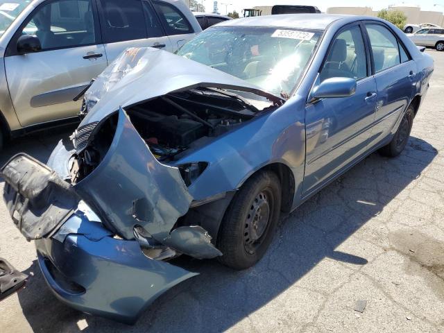 Photo 2 from auction – 2002 TOYOTA CAMRY LE with VIN JTDBE32K520121457