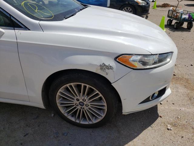 Photo 9 from auction – 2014 FORD FUSION SE with VIN 3FA6P0H93ER242559