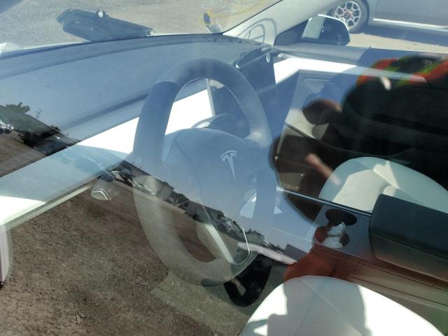Photo 8 from auction – 2021 TESLA MODEL 3 with VIN 5YJ3E1EA2MF989822