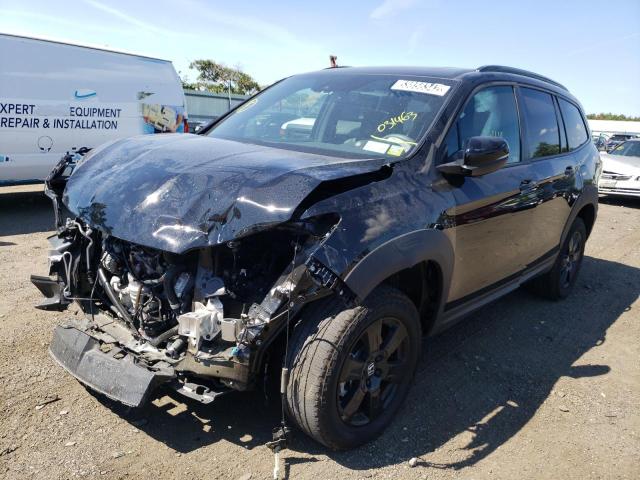 Photo 2 from auction – 2022 HONDA PILOT TRAI with VIN 5FNYF6H87NB031463