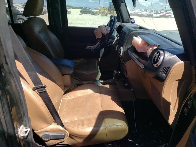 Photo 5 from auction – 2011 JEEP WRANGLER U with VIN 1J4BA6H11BL536635