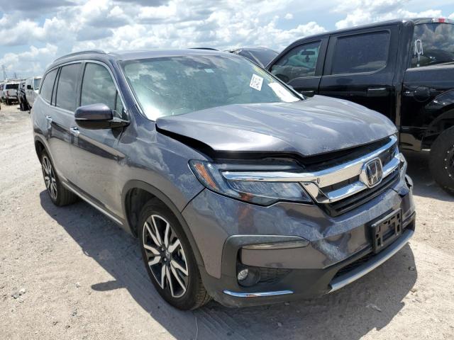 HONDA PILOT TOUR 2021 with VIN 5FNYF5H95MB043869 - Photo from auction