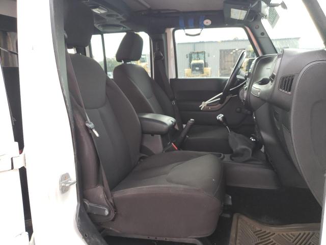 Photo 5 from auction – 2014 JEEP WRANGLER U with VIN 1C4BJWDG9EL104329