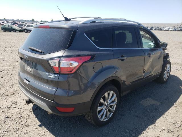 Photo 4 from auction – 2018 FORD ESCAPE TIT with VIN 1FMCU9J91JUC49075
