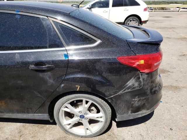 Photo 9 from auction – 2015 FORD FOCUS TITA with VIN 1FADP3J29FL275085