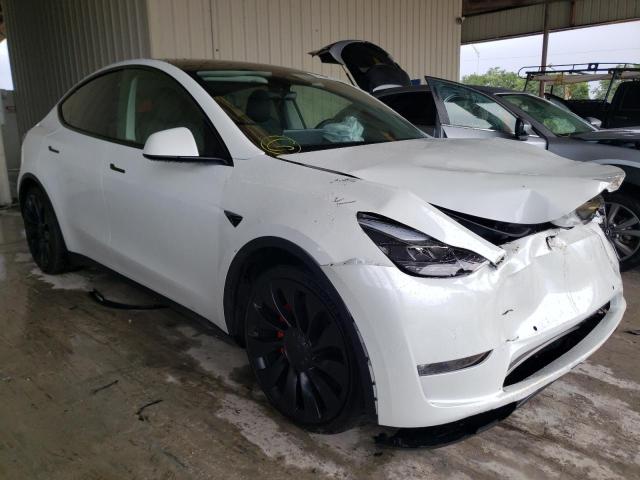 TESLA MODEL Y 2022 with VIN 7SAYGDEF0NF457518 - Photo from auction