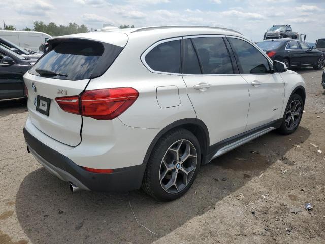 Photo 4 from auction – 2016 BMW X1 XDRIVE2 with VIN WBXHT3C3XG5E47083