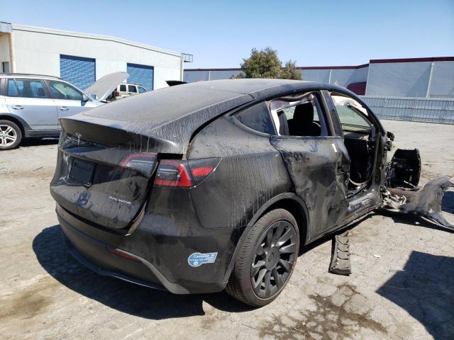 Photo 4 from auction – 2021 TESLA MODEL Y with VIN 5YJYGAEE2MF191131