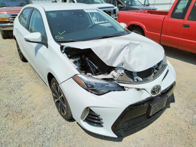 TOYOTA COROLLA L 2017 with VIN 5YFBURHE3HP641923 - Photo from auction