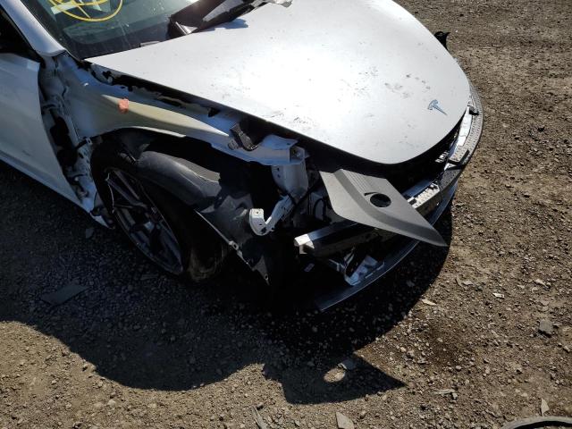 Photo 9 from auction – 2021 TESLA MODEL 3 with VIN 5YJ3E1EA2MF989822