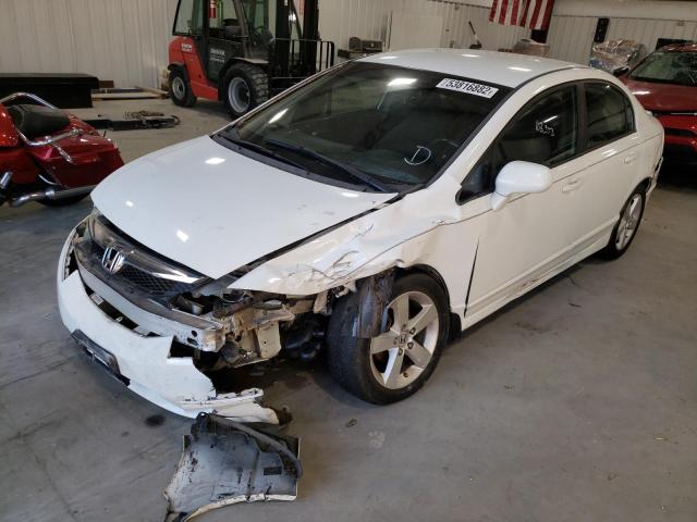 Photo 9 from auction – 2011 HONDA CIVIC LX-S with VIN 19XFA1F6XBE008612