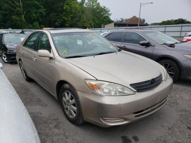 TOYOTA CAMRY LE 2002 with VIN 4T1BF30K42U502026 - Photo from auction
